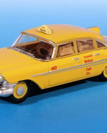 INT.Oxford Diecast 87.Plymouth Belvedere Taxi(1)